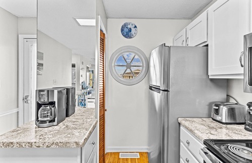 Holden Beach Condo | Lower Waterfront Condo with Oceanfront Balcony, Shared Outdoor Pool, WiFi & AC