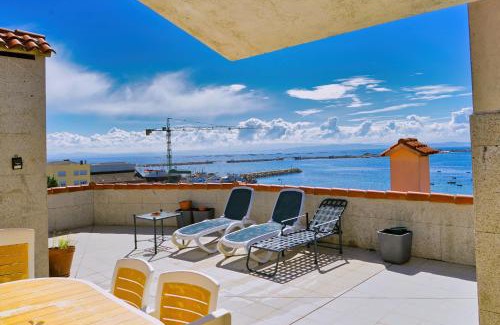 Aguino Apartment | Lujo y vistas panorámicas en primera línea de mar