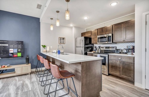 Gateway District Apartment | Luxe 1B in Heart of Downtown Pool & Spa Gym