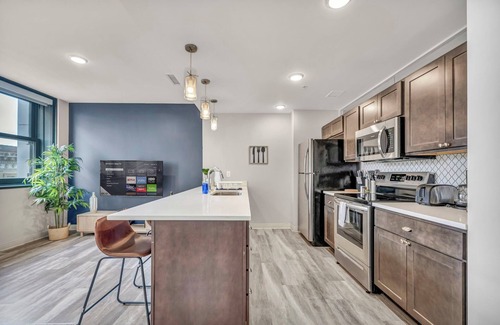 Gateway District Apartment | Luxe 1B in Heart of Downtown Pool & Spa Gym