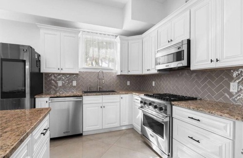 Riverside House | Luxe 5BR/4BA with Pool, Hot tub, & 5 Mins to Beach