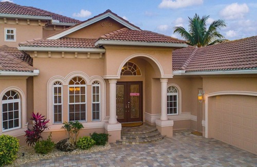Caloosahatchee Villa | Luxe Canal Villa! Direct Gulf access pool home, sleeps up to 15.