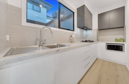 Clyde North House | Luxe designer house with Pool, Cinema & Gym