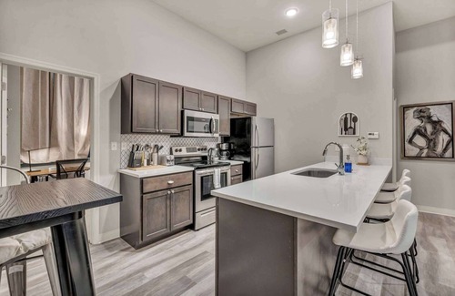 Gateway District Apartment | Luxe Flat w/Heated Pool & Sauna Gym Heart of DT