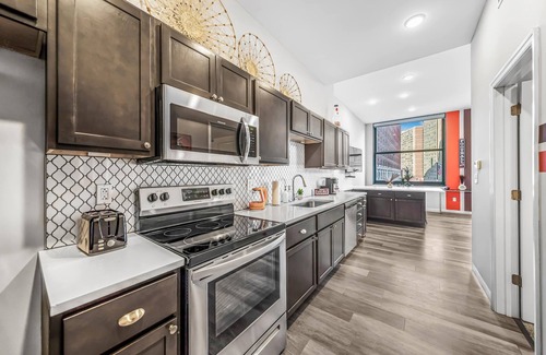 Gateway District Apartment | Luxe Flat w/Heated Pool & Sauna Gym Heart of DT