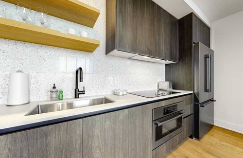 Rainey Street Historic District Condo | Luxe High Rise off of Rainey St.