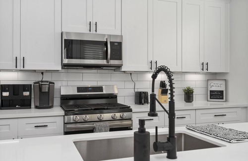 Northside House | Luxe Home - Modern Retreat, 1 Exit from Downtown