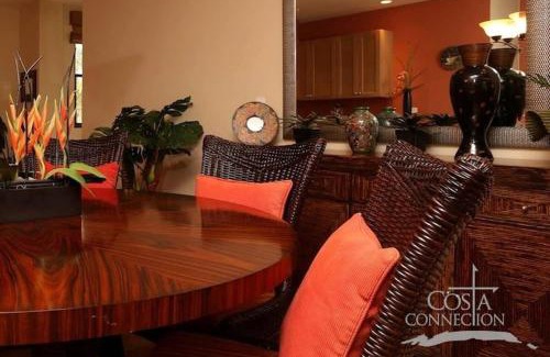 Coco House | Luxe! Impressively designed 2nd-floor unit in Coco done in red and orange hues