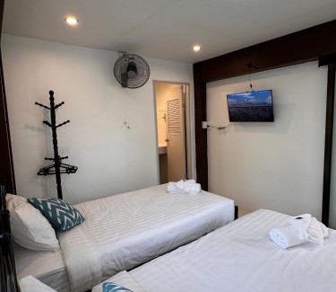 K. Phu Pieng Bed & Breakfast | Luxe Nan Twin Bed Room