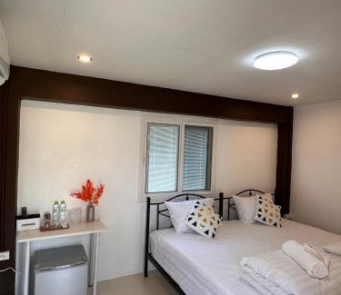 K. Phu Pieng Bed & Breakfast | Luxe Nan Twin Bed Room