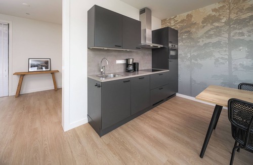 Zeewolde House | Luxurious 4-person house on the water with modern kitchen, direct access to the water and comfortable furnishings. Perfect for rest and relaxation!