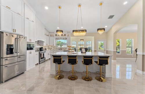 Kissimmee House | Luxurious 5-Bedroom Retreat: Gold Accents, Modern Amenities, & Fun!"
