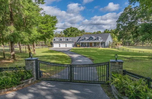Inverness House | Luxurious 6-bedroom estate with pool, on over 6 fenced in acres