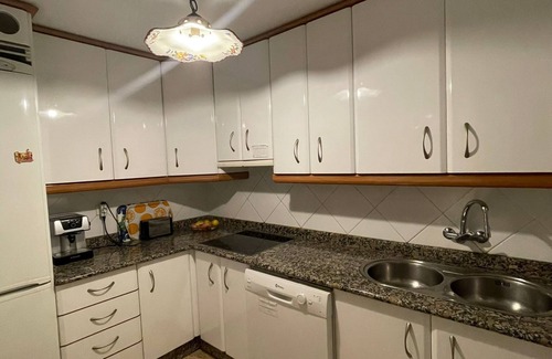 Velilla-Taramay Condo | LUXURIOUS APARTMENT WITH SEA VIEW, WIFI, SATELLITE TV FOR UP TO 6 PEOPLE. BIKES