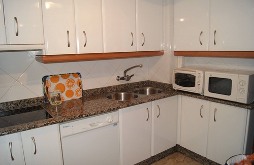 Velilla-Taramay Condo | LUXURIOUS APARTMENT WITH SEA VIEW, WIFI, SATELLITE TV FOR UP TO 6 PEOPLE. BIKES