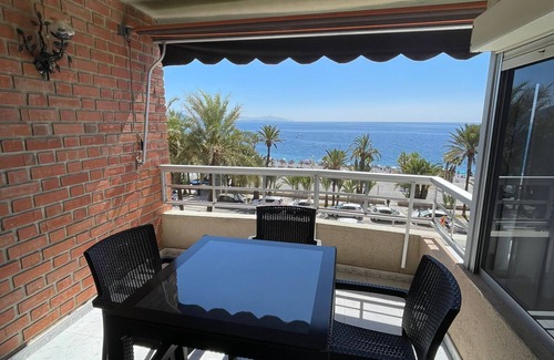 Velilla-Taramay Condo | LUXURIOUS APARTMENT WITH SEA VIEW, WIFI, SATELLITE TV FOR UP TO 6 PEOPLE. BIKES