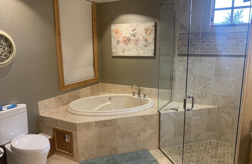Dover Bay Condo | Luxurious first floor Dover Bay condo on the shore of Pend Orielle River.