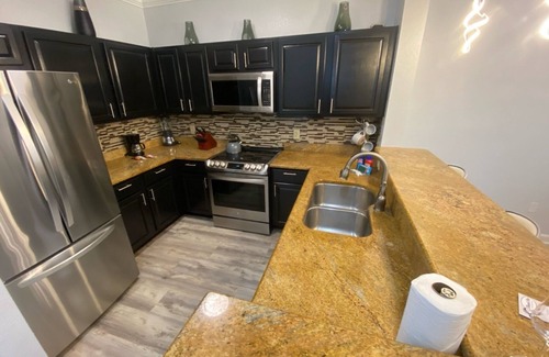Reunion Condo | Luxurious Living at Your Fingertips with King bed