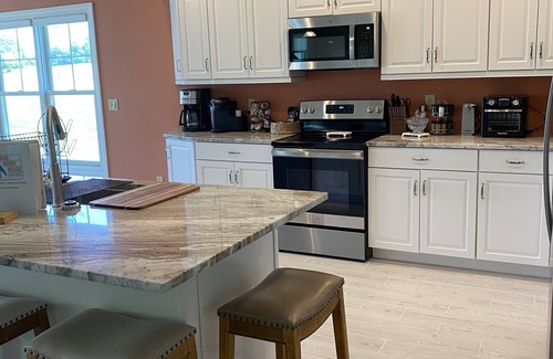 Buford House | Luxurious & Modern newly renovated good for corporate housing & family functions