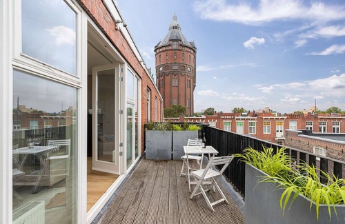 Groningen Apartment | Luxurious rooftop penthouse with rooftop terrace, a balcony, bath, duo shower