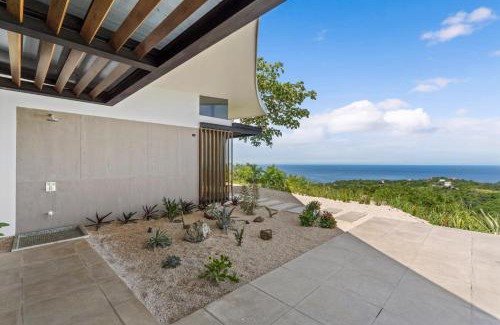 Rio Seco House | Luxurious Ultramodern Property with Private Suites, Infinity Pool, and Sweeping Ocean and Mountain Views