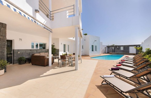 Costa Teguise Villa | Luxurious Villa with Panoramic View, Multiple Terraces and Large Pool
