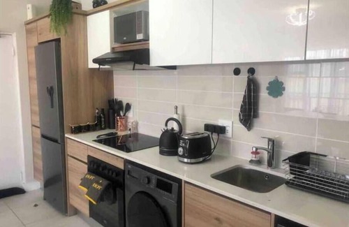 Greater Johannesburg Metropolitan Area Condo | Luxurious Waterfall 1 bedroom Condo