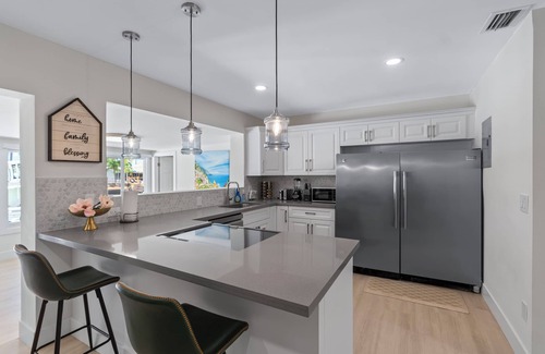 Garden Isles House | Luxurious Waterfront Ocean Access Heated PoolnWD Wifi 75Ft Dock Bring Your Boat