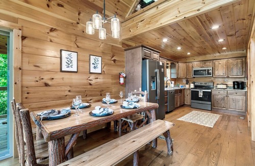Gatlinburg - Pigeon Forge Cabin | Luxury 3 King Suites Cabin, Mountain Views, FirePit, HotTub, Games, Pet friendly