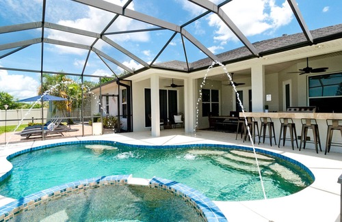 Trailer Estates House | Luxury 4 BR/3BA Waterview Home w/Pool + Spa with work space