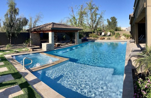 Queen Creek House | Luxury 4 BR, pool/spa w/ swim up bar, mist system, putting greens, pool table.