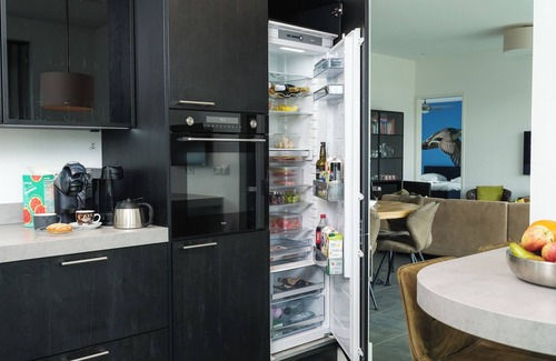 Zeewolde House | Luxury 4-person villa on the water. Including sun shower, canoe, sup board, beautiful garden and private jetty. Enjoy peace and comfort!