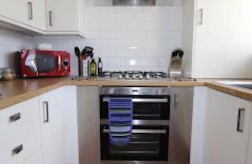 Brighton House | Luxury 5 bed house near to City Centre and Beaches. Sleeps 12, outside courtyard