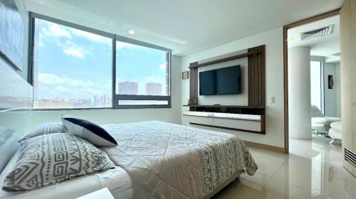 Riomar Apartment | Luxury Apartamento Hilton WI-FI, TV, Piscina y Gym