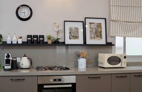 Tel Aviv Apartment | luxury apartment & backyardn 700 sq ft private backyard with a seating eating.