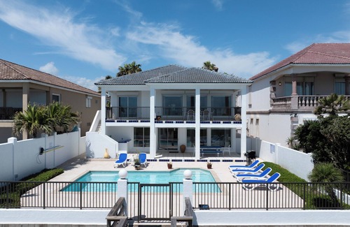 South Padre Island House | Luxury Beachfront Home w/private beach access & private heated pool!