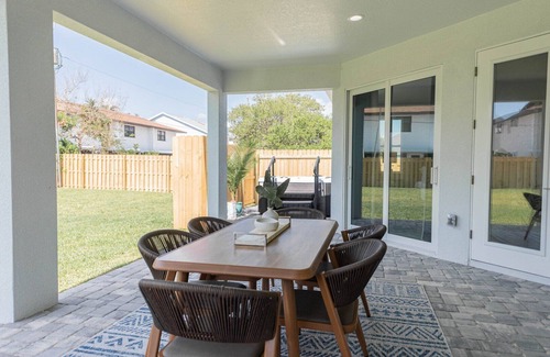 Cape Caneveral Beach Gardens House | Luxury Coastal Home - Steps to Beach w/Private Backyard, Hot Tub & Games Room!