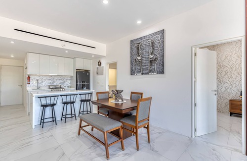 El Medano Ejidal Apartment | Luxury condo with shared gym, rooftop pool, and centrally located