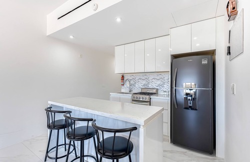 El Medano Ejidal Apartment | Luxury condo with shared gym, rooftop pool, and centrally located
