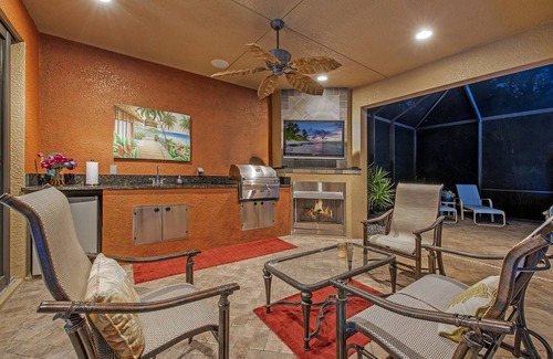 Central Naples House | Luxury Estate Home - Private Oversized Pool, Hot Tub, Summer Kitchen + Fireplace