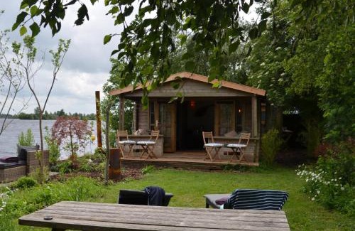 Baambrugse Zuwe House | Luxury Experience in Off The Grid Lodge at an Amazing Lake Vinkeveense Plassen