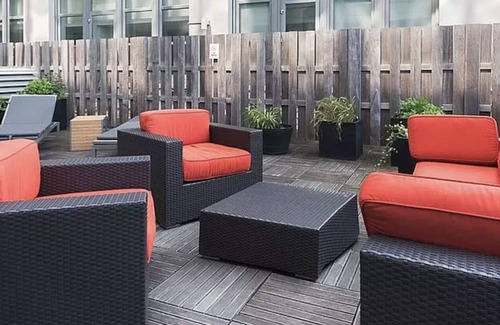 Jersey City Condo | Luxury furnished condo room and private bathroom. Quick NYC commute!