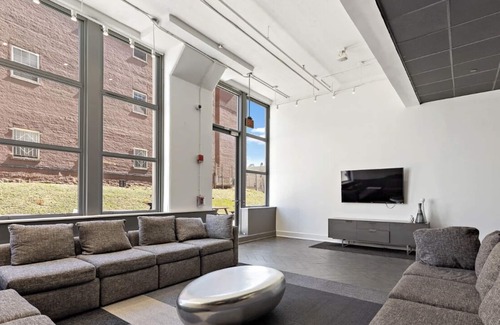 Jersey City Condo | Luxury furnished condo room and private bathroom. Quick NYC commute!