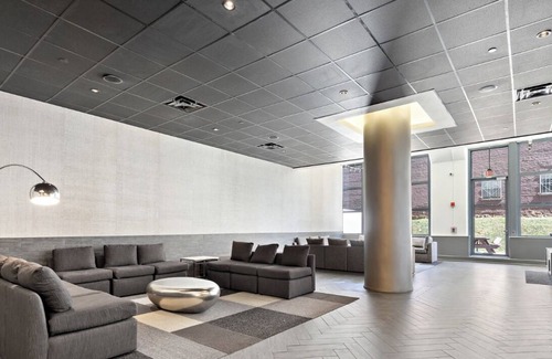 Jersey City Condo | Luxury furnished condo room and private bathroom. Quick NYC commute!