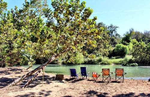 Fentress House | Luxury Glamping on 100+ Acres on the San Marcos River at Wahwahtaysee Resort