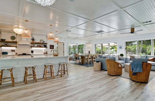 Holmes Beach House | Luxury ground, pet friendly - king suites, heated pool & hot tub - canal!