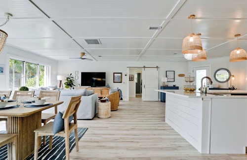 Holmes Beach House | Luxury ground, pet friendly - king suites, heated pool & hot tub - canal!