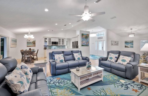 Pelican House | Luxury Gulf Access Pool Home With Large Tiki Hut Close to Tarpon Point Marina