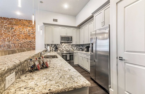 Central Business District Condo | 🎷Luxury Historic Downtown Location LG Private Balcony | The Armstrong 🎷