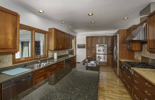 Eagle River House | Luxury Historic Eagle River Chain Lake Estate *Summer Fri to Fri Only*
